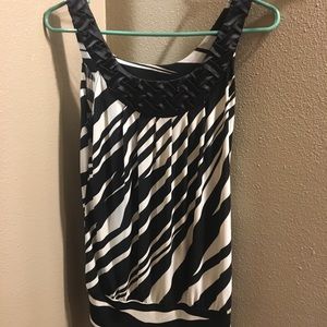 Braided top, black tank top.